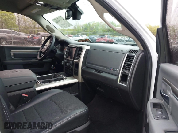2018 Ram 1500 Lone Star Silver with VIN 1C6RR6LT1JS119520, listed as a IAAI auction lot 41968636 with 114,681 mi miles and . Bid and sale history available at DreamBid. Image 5.