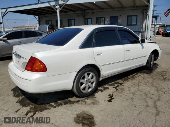 2000 Toyota Avalon XL with VIN 4T1BF28B9YU068001, listed as a Copart auction lot 54958915 with 240,232 mi miles and Salvage Title. Bid and sale history available at DreamBid. Image 3.