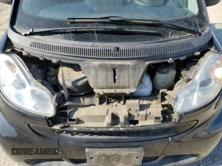 2012 Smart fortwo Pure z VIN WMEEJ3BA4CK572144, wystawiony jako Copart lot #42556025 z przebiegiem 99 007 mil mil oraz Tytuł czysty. Historia ofert i sprzedaży dostępna na DreamBid. Obrazek 11.