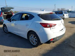 2014 Mazda 3 i Grand Touring with VIN JM1BM1M7XE1102093, listed as a IAAI auction lot 41344433 with 148,395 mi miles and . Bid and sale history available at DreamBid. Image 3.