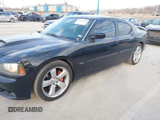 2006 Dodge Charger SRT-8 with VIN 2B3LA73W96H371246, listed as a IAAI auction lot 41676168 with 130,064 mi miles and . Bid and sale history available at carsss.com. Image 6.