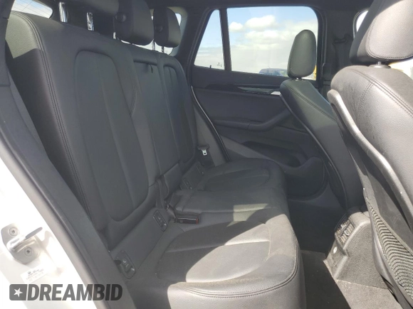 2017 BMW X1 sDrive28i with VIN WBXHU7C39H5H37756, listed as a Copart auction lot 50769975 with 82,479 mi miles and Salvage Title. Bid and sale history available at carsss.com. Image 11.