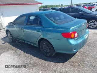 2009 Toyota Corolla with VIN JTDBL40EX99034801, listed as a IAAI auction lot 41943591 with 204,674 mi miles. Bid and sale history available at carsss.com. Image 3.