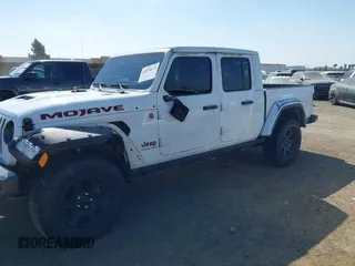 2023 Jeep Gladiator Mojave z VIN 1C6JJTEG7PL536582, wystawiony jako IAAI lot #42074073 z przebiegiem 34 262 mil mil oraz . Historia ofert i sprzedaży dostępna na DreamBid. Obrazek 6.