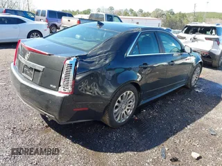 2012 Cadillac CTS Premium with VIN 1G6DP5E3XC0131943, listed as a IAAI auction lot 41747969 with 70,859 mi miles and . Bid and sale history available at DreamBid. Image 4.