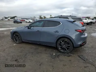 2024 Mazda 3 S Carbon Edition with VIN JM1BPBLM5R1655857, listed as a Copart auction lot 48518815 with 15,549 mi miles and Salvage Title. Bid and sale history available at DreamBid. Image 2.