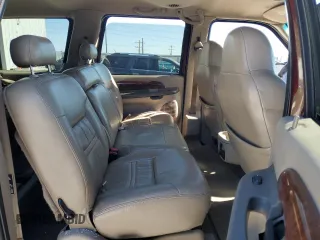 2001 Ford Excursion Limited z VIN 1FMSU43F31EC79481, wystawiony jako Copart lot #55257015 z przebiegiem 188 077 mil mil oraz Szkoda całkowita • Salvage title. Historia ofert i sprzedaży dostępna na DreamBid. Obrazek 11.