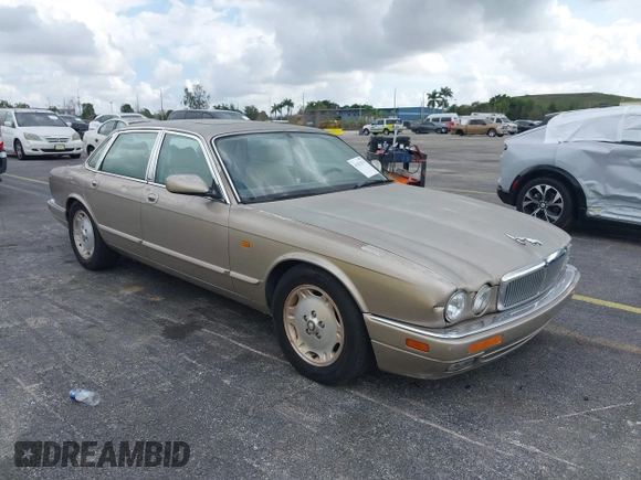 1997 Jaguar XJ with VIN SAJHX1243VC811786, listed as a IAAI auction lot 41451521 with Not provided miles and . Bid and sale history available at DreamBid. Image 1.