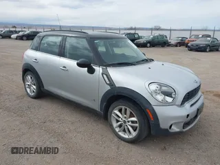 2014 MINI Countryman S z VIN WMWZC5C56EWM18681, wystawiony jako IAAI lot #41505493 z przebiegiem 71 010 mil mil oraz . Historia ofert i sprzedaży dostępna na DreamBid. Obrazek 1.