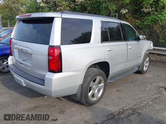 2019 Chevrolet Tahoe LT with VIN 1GNSCBKCXKR219413, listed as a IAAI auction lot 42013260 with 92,886 mi miles and . Bid and sale history available at DreamBid. Image 4.