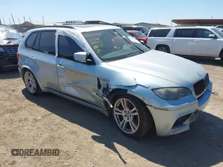 2011 BMW X5 M with VIN 5YMGY0C53BLK26167, listed as a IAAI auction lot 41742529 with 118,777 mi miles. Bid and sale history available at carsss.com. Image 1.