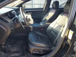 2015 Ford Taurus SEL z VIN 1FAHP2E85FG151155, wystawiony jako Copart lot #77791634 z przebiegiem 224 144 mil mil oraz Szkody całkowita. Historia ofert i sprzedaży dostępna na DreamBid. Obrazek 7.