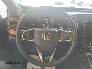 2021 Honda CR-V EX with VIN 2HKRW2H57MH642743, listed as a IAAI auction lot 42832414 with 58,006 mi miles and . Bid and sale history available at DreamBid. Image 44.