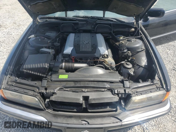 1995 BMW 7 Series 740i с VIN WBAGF6320SDH00710, выставлен на аукционе Copart как лот 54091515 с пробегом 205 085 миль миль и Чистый • Clean title. История ставок и продаж доступна на DreamBid. Изображение 11.
