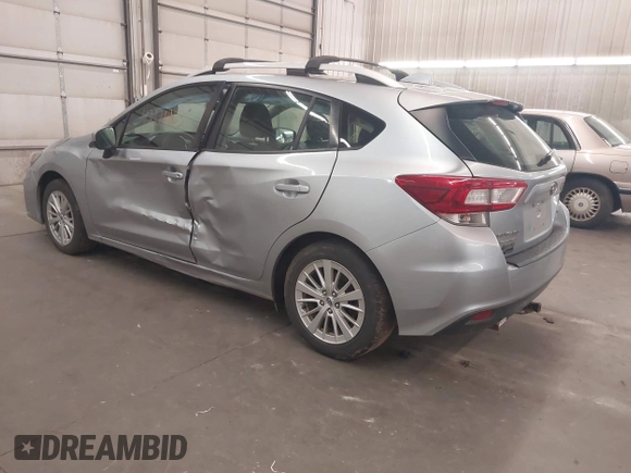 2017 Subaru Impreza Premium with VIN 4S3GTAB67H3740524, listed as a IAAI auction lot 42171963 with 148,495 mi miles and . Bid and sale history available at DreamBid. Image 3.