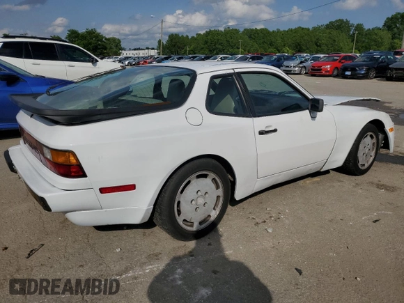 1987 Porsche 944 с VIN WP0AA094XHN450664, выставлен на аукционе Copart как лот 57918205 с пробегом 115 949 миль миль и Списание • Salvage title. История ставок и продаж доступна на DreamBid. Изображение 3.
