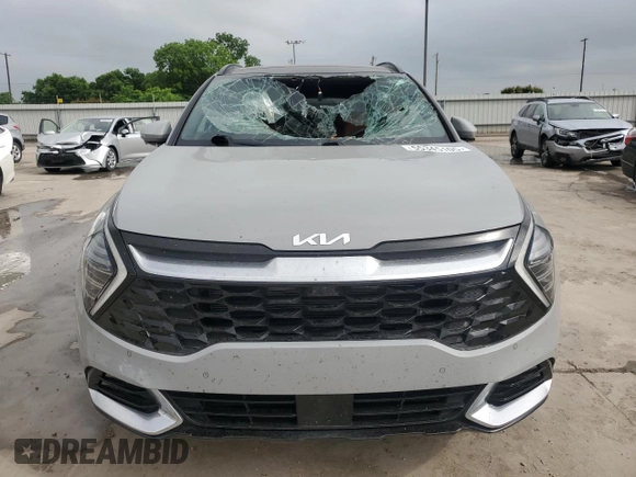 2023 Kia Sportage SX-Prestige z VIN 5XYK53AFXPG031551, wystawiony jako Copart lot #55345105 z przebiegiem Nie podano mil oraz Szkoda całkowita • Salvage title. Historia ofert i sprzedaży dostępna na DreamBid. Obrazek 5.