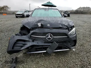 2021 Mercedes-Benz E-Class E 450 with VIN W1KZF5KBXMA880082, listed as a Copart auction lot 44267945 with 31,239 mi miles and Salvage Title. Bid and sale history available at carsss.com. Image 5.