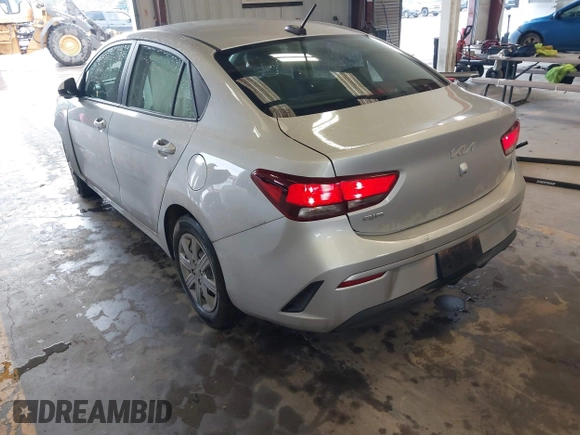 2022 Kia Rio S with VIN 3KPA24AD2NE473517, listed as a IAAI auction lot 41704769 with 52,810 mi miles. Bid and sale history available at carsss.com. Image 3.
