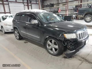 2011 Jeep Grand Cherokee Overland with VIN 1J4RR6GTXBC701186, listed as a IAAI auction lot 41553697 with 172,317 mi miles. Bid and sale history available at carsss.com. Image 1.