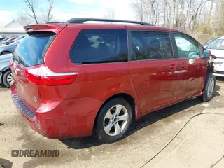 2015 Toyota Sienna LE AAS with VIN 5TDKK3DC9FS546455, listed as a IAAI auction lot 41674823 with 94,941 mi miles. Bid and sale history available at carsss.com. Image 4.