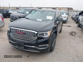 2017 GMC Acadia Denali with VIN 1GKKNPLSXHZ323869, listed as a IAAI auction lot 41600828 with 131,676 mi miles. Bid and sale history available at carsss.com. Image 2.