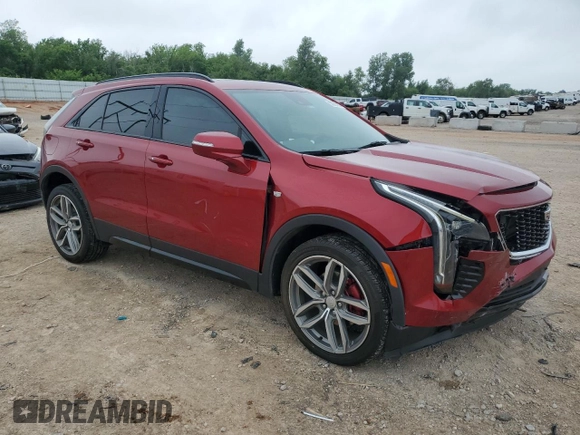 2021 Cadillac XT4 FWD Sport with VIN 1GYFZER49MF082391, listed as a Copart auction lot 56256804 with 24,415 mi miles and Salvage Title. Bid and sale history available at DreamBid. Image 4.