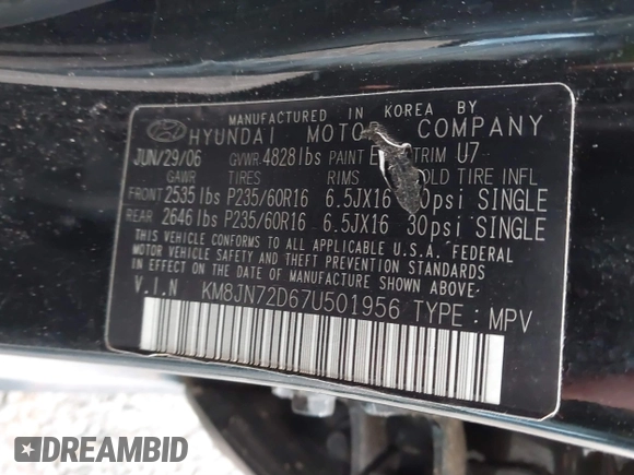 2007 Hyundai Tucson SE with VIN KM8JN72D67U501956, listed as a IAAI auction lot 41513205 with 165,071 mi miles and . Bid and sale history available at DreamBid. Image 9.