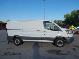2015 Ford Transit Cargo with VIN 1FTNE1YM1FKA98814, listed as a IAAI auction lot 42124071 with 172,064 mi miles and . Bid and sale history available at DreamBid. Image 13.