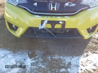 2015 Honda Fit EX-L z VIN 3HGGK5H84FM717976, wystawiony jako IAAI lot #38167874 z przebiegiem 110 963 mil mil oraz . Historia ofert i sprzedaży dostępna na DreamBid. Obrazek 6.