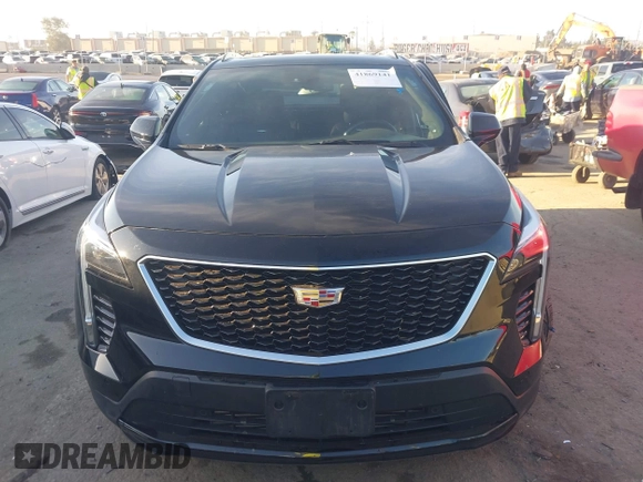 2019 Cadillac XT4 FWD Sport z VIN 1GYFZER43KF183181, wystawiony jako IAAI lot #41869141 z przebiegiem 25 539 mil mil oraz . Historia ofert i sprzedaży dostępna na DreamBid. Obrazek 12.