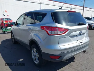 2013 Ford Escape SE with VIN 1FMCU9GX5DUB17091, listed as a IAAI auction lot 42047494 with 137,500 mi miles and . Bid and sale history available at DreamBid. Image 3.