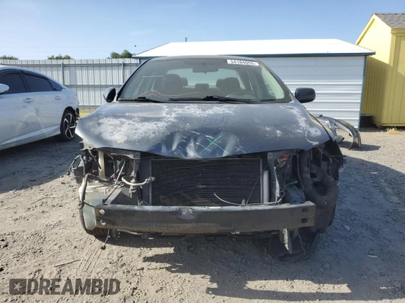 2010 Toyota Corolla with VIN 1NXBU4EEXAZ212290, listed as a Copart auction lot 54184055 with 284,234 mi miles and Salvage Title. Bid and sale history available at DreamBid. Image 5.