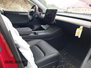 2023 Tesla Model Y Long Range with VIN 7SAYGAEE5PF685474, listed as a IAAI auction lot 40348773 with 26,605 mi miles and . Bid and sale history available at DreamBid. Image 5.