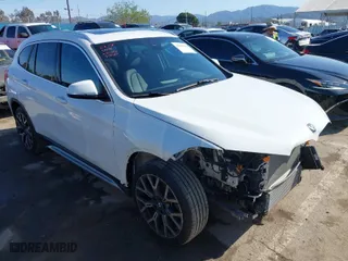 2021 BMW X1 sDrive28i with VIN WBXJG7C08M5S34659, listed as a IAAI auction lot 41841612 with 15,640 mi miles. Bid and sale history available at carsss.com. Image 1.