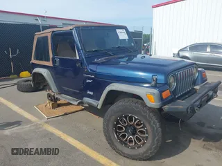 2002 Jeep Wrangler Sport with VIN 1J4FA49S72P729703, listed as a IAAI auction lot 42468446 with 164,342 mi miles and . Bid and sale history available at DreamBid. Image 1.