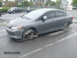 2012 Honda Civic LX with VIN 2HGFB2F58CH593658, listed as a IAAI auction lot 41965400 with 172,340 mi miles and . Bid and sale history available at DreamBid. Image 17.
