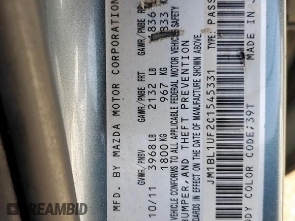 2012 Mazda 3 i Sport with VIN JM1BL1UF2C1545331, listed as a Copart auction lot 54230345 with 139,799 mi miles and Salvage Title. Bid and sale history available at DreamBid. Image 12.