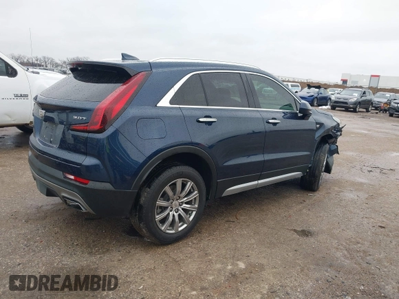 2019 Cadillac XT4 FWD Premium Luxury with VIN 1GYFZCR46KF171126, listed as a IAAI auction lot 41557387 with 88,811 mi miles. Bid and sale history available at carsss.com. Image 4.