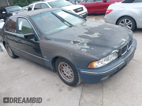 1997 BMW 5 Series 528i z VIN WBADD6321VBW05322, wystawiony jako IAAI lot #42284323 z przebiegiem 200 441 mil mil oraz . Historia ofert i sprzedaży dostępna na DreamBid. Obrazek 1.
