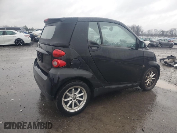 2009 Smart fortwo Passion z VIN WMEEK31X59K270597, wystawiony jako Copart lot #43187955 z przebiegiem 67 842 mil mil oraz Czysty tytuł • Clean title. Historia ofert i sprzedaży dostępna na DreamBid. Obrazek 3.