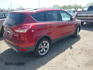 2014 Ford Escape Titanium with VIN 1FMCU0JX8EUC19300, listed as a IAAI auction lot 42138925 with 111,709 mi miles. Bid and sale history available at carsss.com. Image 4.