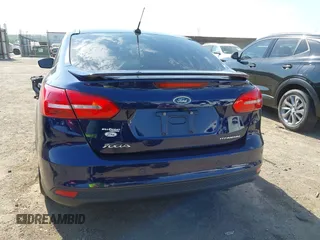 2017 Ford Focus Titanium with VIN 1FADP3J29HL204892, listed as a IAAI auction lot 42032705 with 119,028 mi miles and . Bid and sale history available at DreamBid. Image 17.