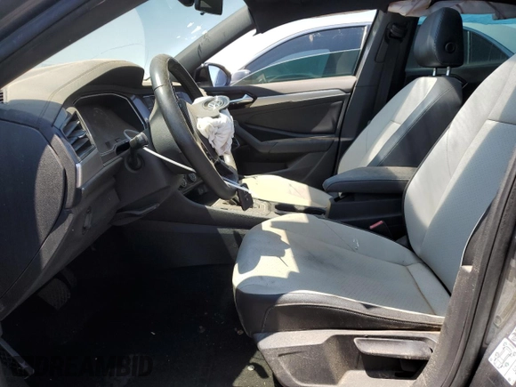 2019 Volkswagen Jetta S z VIN 3VWC57BU4KM165053, wystawiony jako Copart lot #57496775 z przebiegiem 76 937 mil mil oraz Szkoda całkowita • Salvage title. Historia ofert i sprzedaży dostępna na DreamBid. Obrazek 7.