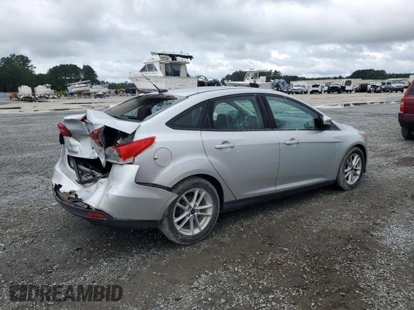 2016 Ford Focus SE with VIN 1FADP3F22GL402818, listed as a Copart auction lot 59500485 with 142,814 mi miles and Salvage title. Bid and sale history available at DreamBid. Image 3.