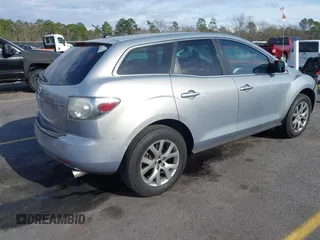2009 Mazda CX-7 Sport with VIN JM3ER293690218999, listed as a IAAI auction lot 41706965 with 164,806 mi miles. Bid and sale history available at carsss.com. Image 4.