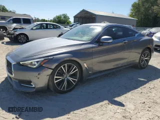 2021 Infiniti Q60 Luxe с VIN JN1EV7KK6MM410205, выставлен на аукционе Copart как лот 52603565 с пробегом 74 153 миль миль и На запчасти • Non repairable. История ставок и продаж доступна на DreamBid. Изображение 1.