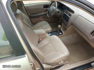 1997 Toyota Avalon XL with VIN 4T1BF12B1VU202935, listed as a IAAI auction lot 41900467 with 274,960 mi miles. Bid and sale history available at carsss.com. Image 5.