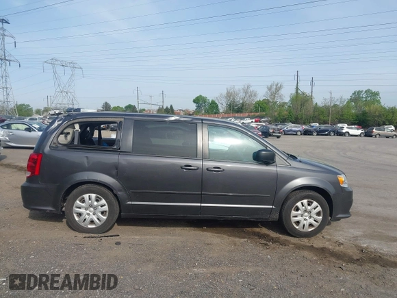 2017 Dodge Grand Caravan SE Plus z VIN 2C4RDGBGXHR549334, wystawiony jako IAAI lot #42097288 z przebiegiem 60 896 mil mil oraz . Historia ofert i sprzedaży dostępna na DreamBid. Obrazek 13.