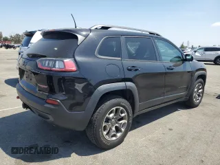 2021 Jeep Cherokee Trailhawk with VIN 1C4PJMBX8MD167153, listed as a Copart auction lot 54929845 with 52,800 mi miles and Clean title. Bid and sale history available at DreamBid. Image 3.